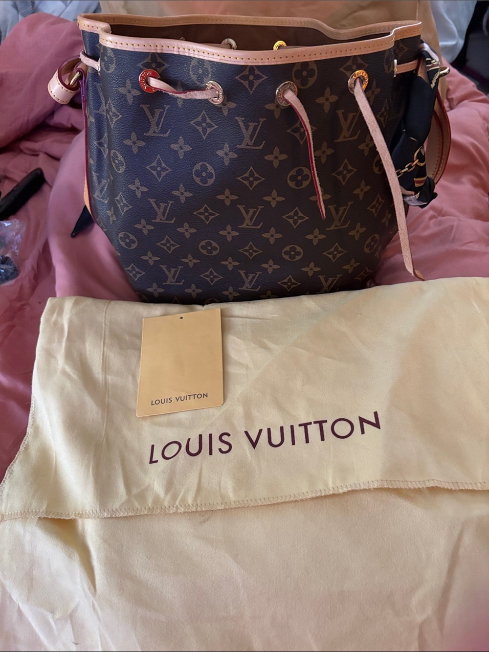 Louis Vuitton Monogram Bucket Bag with Pink Vachetta Trim
